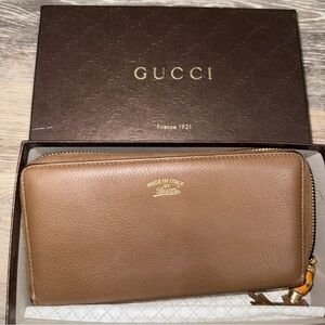 Gucci Tan Leather bamboo tassle with Gold Logo